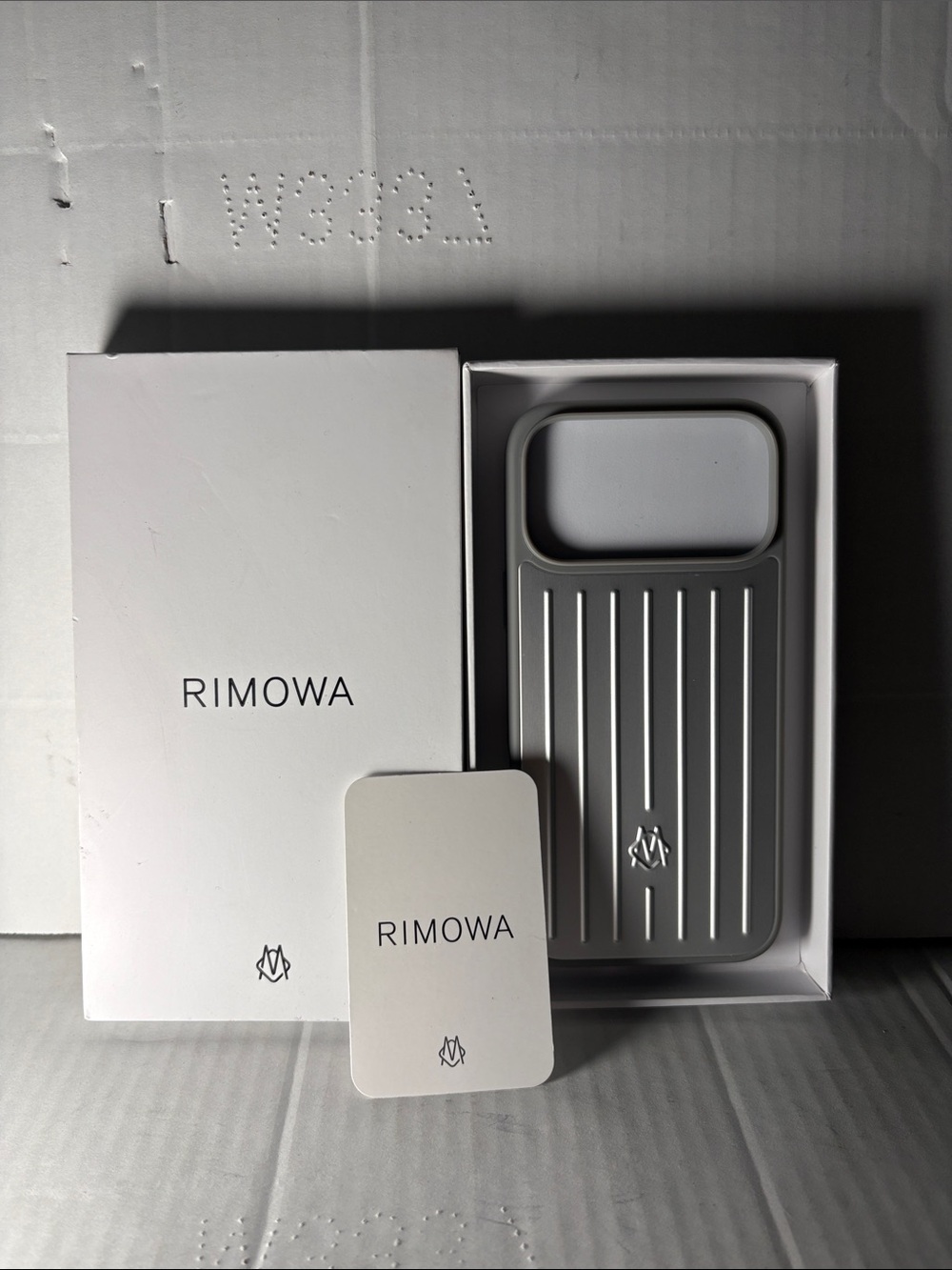 RIMOWA Silver Ribbed iPhone Case with Branded Card